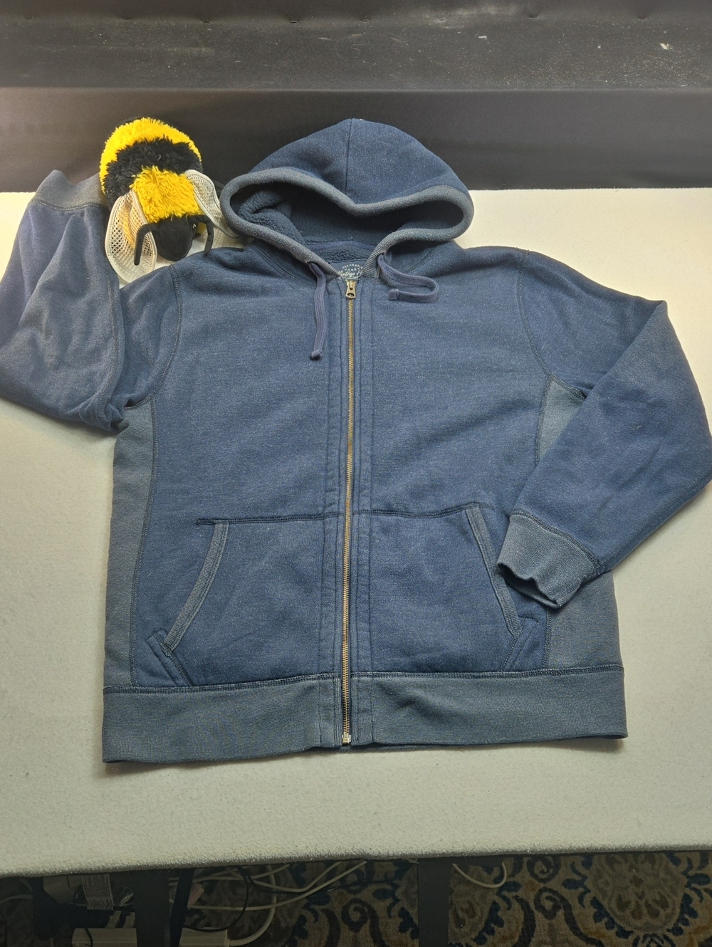 authentic J.Crew "Vintage Fleece" men's full-zip hoodie in a faded blue.
